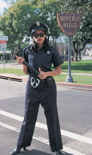 18 year old girl Megan Rain removes her sandals and then clothes to pose naked